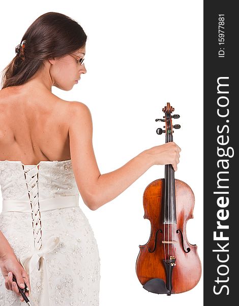 Young woman violinist, turn their backs, with a violin. Young woman violinist, turn their backs, with a violin