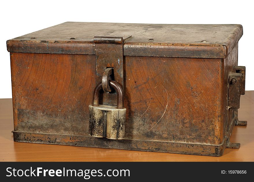 Vintage strongbox of brown color with the lock.