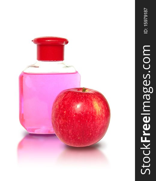 An apple and a bottle of shampoo are shown in the picture. An apple and a bottle of shampoo are shown in the picture.