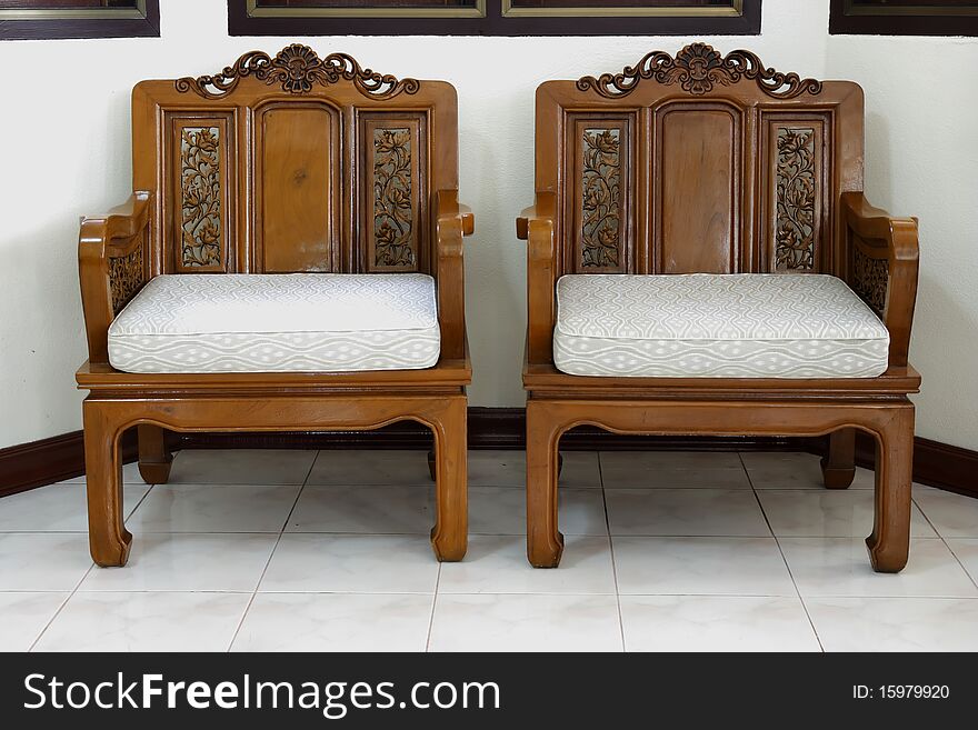 Wooden chairs carved with beautiful patterns.