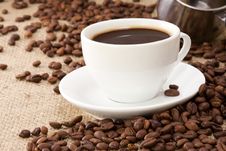 Beans And Cup On Sackcloth Royalty Free Stock Photography Beans And Cup On Sackcloth Royalty Free Stock Photography