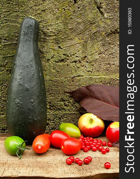 Harvest time. Fresh tasty vegetables on the wooden table