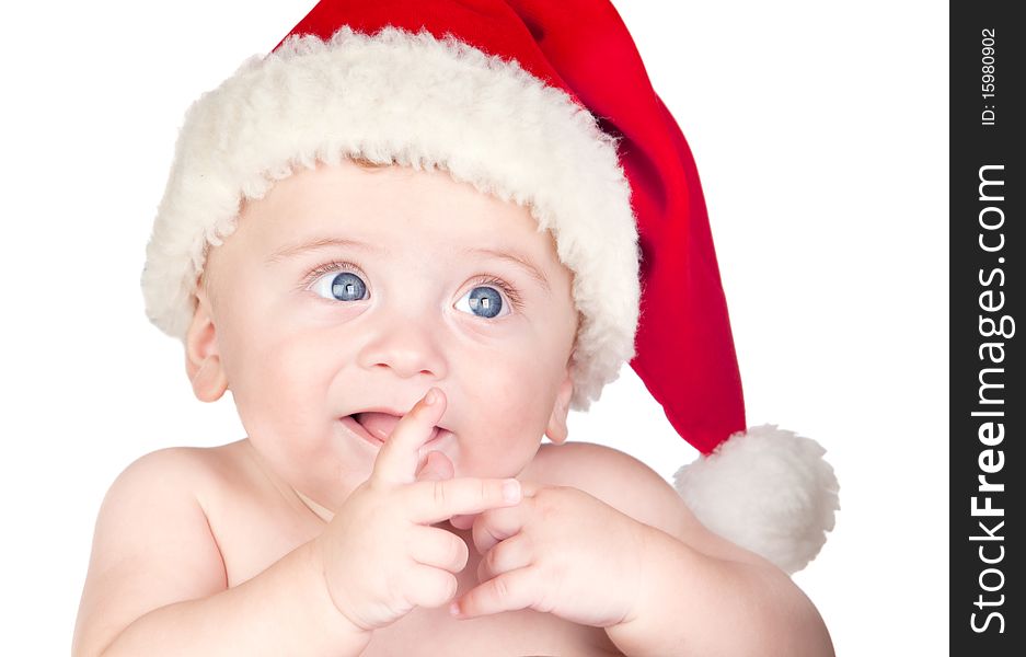 Beautiful babe with blue eyes and Christmas hat isolated on white background