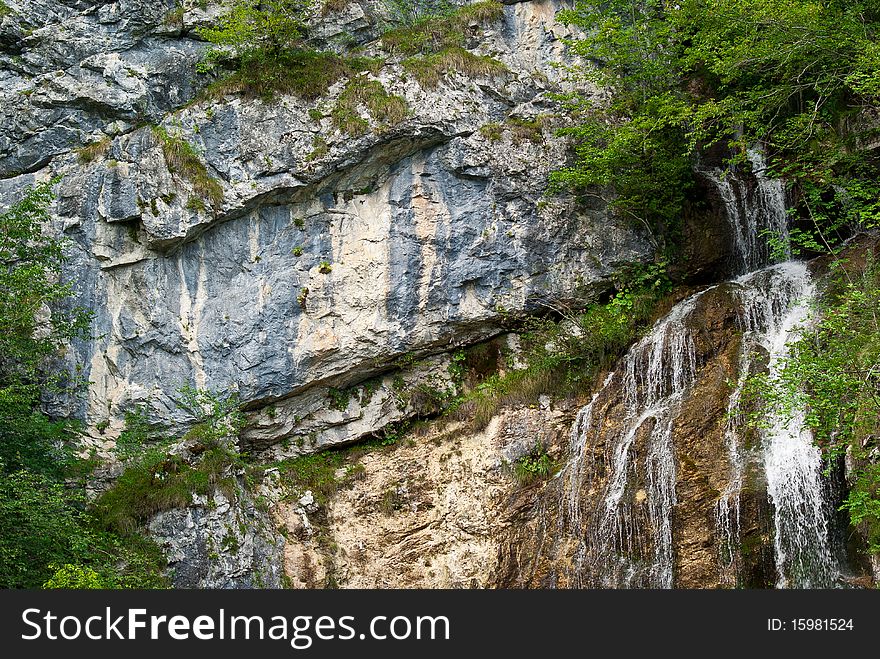 Waterfall Molveno: waterfall on the walk of Lake molveno in summer in Trentino