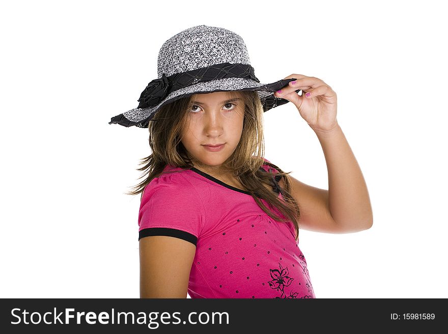 A young girl wearing a hat