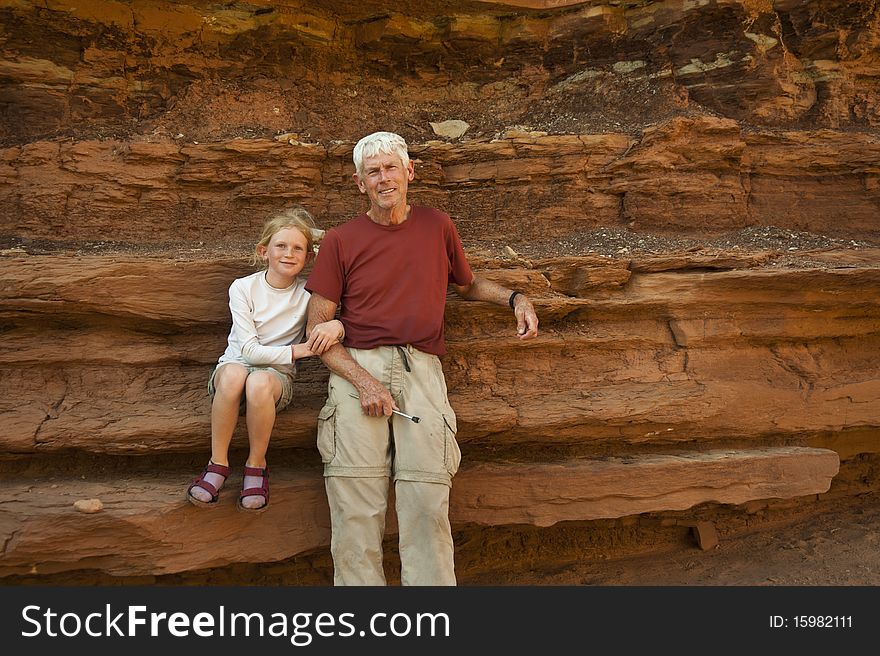 Father and daughter in the desert