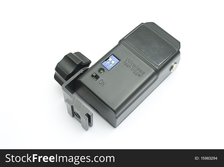 One black wireless flash receiver for a SLR camera