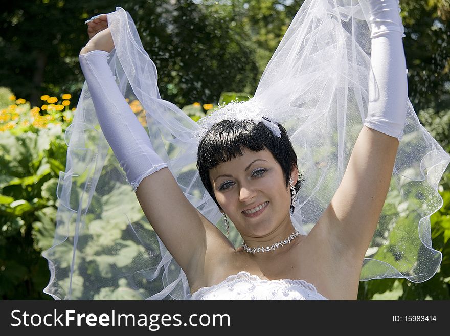 Beautiful and happy bride with outdoors. Beautiful and happy bride with outdoors.