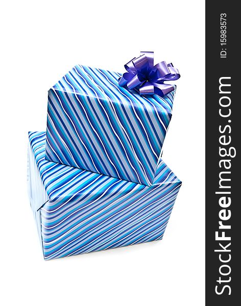 Blue paper gifts boxes with bow. Isolated on white background. Blue paper gifts boxes with bow. Isolated on white background