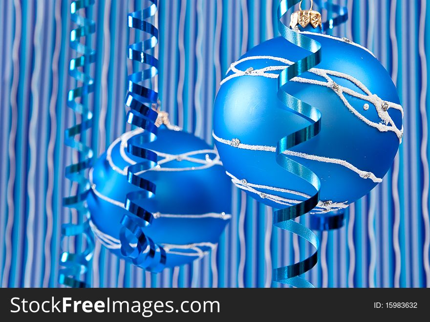 Christmas decoration from two blue balls on blue background. Christmas decoration from two blue balls on blue background