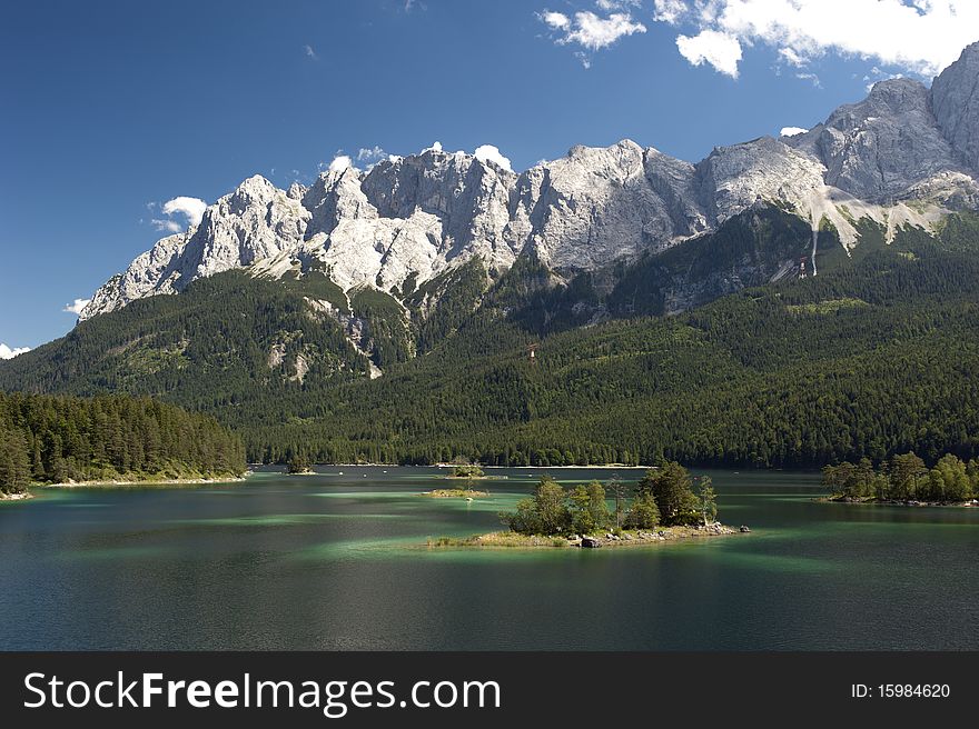 Lake named Eibsee in upper bavaria germany at the alps mountains. Lake named Eibsee in upper bavaria germany at the alps mountains