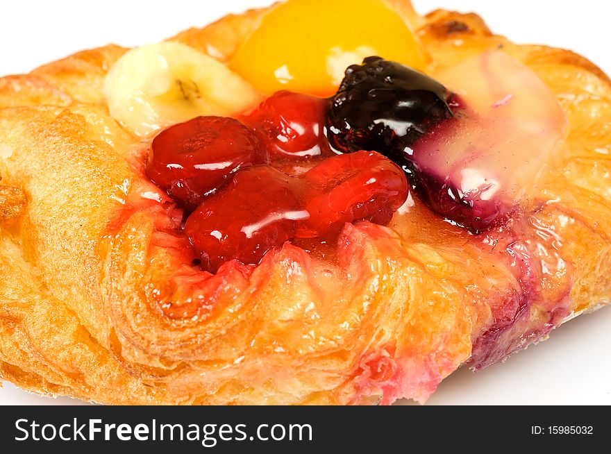 Fruitcake. cake with fruits like, pineapple, banana, raspberry, peach and blackberry