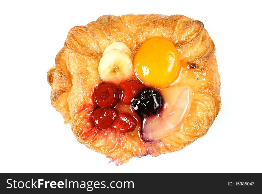 Fruitcake. cake with fruits like, pineapple, banana, raspberry, peach and blackberry