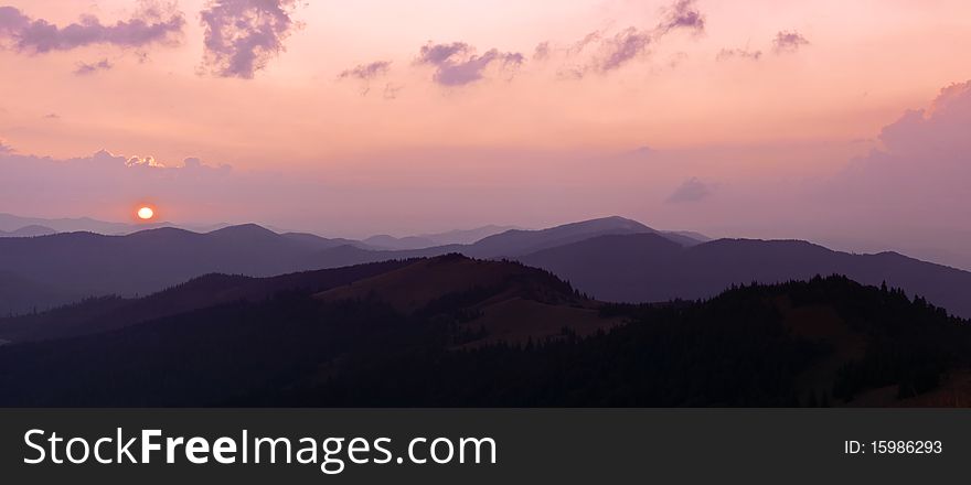 Beauty purple sunset on mountain