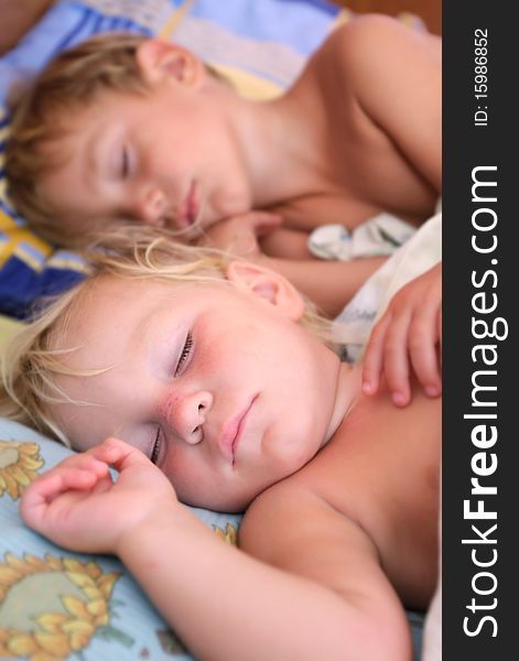 Portrait of two sleeping kids