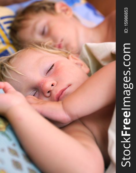 Portrait of two sleeping kids