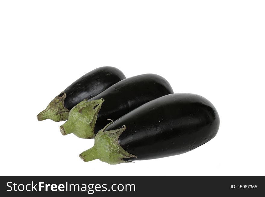 Ripe fresh eggplants in isolated over white background