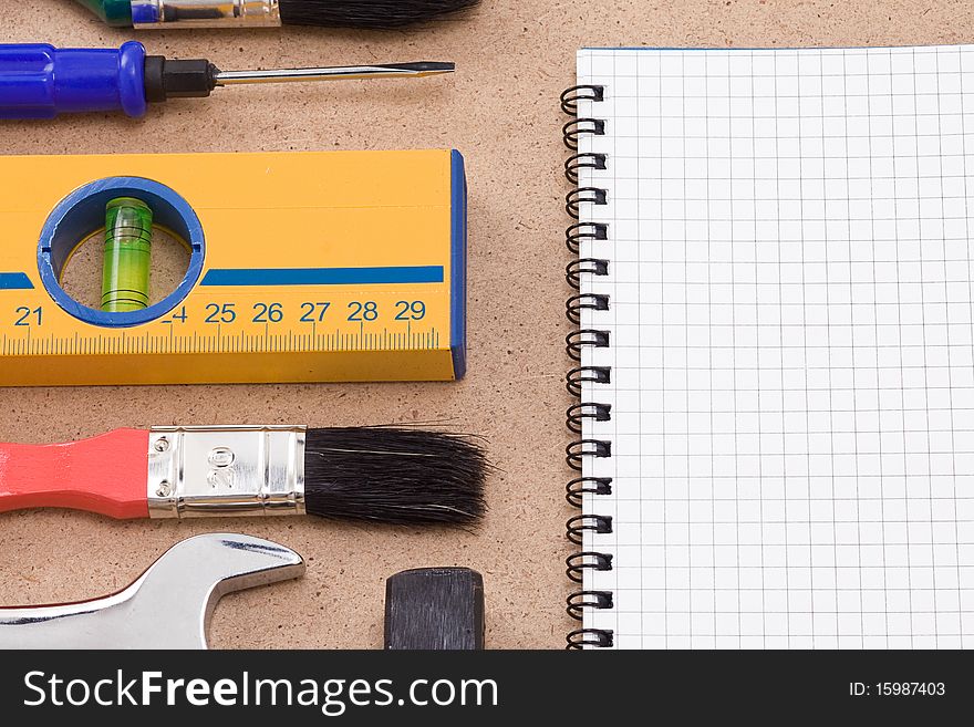 Horizontal image of tools and pad