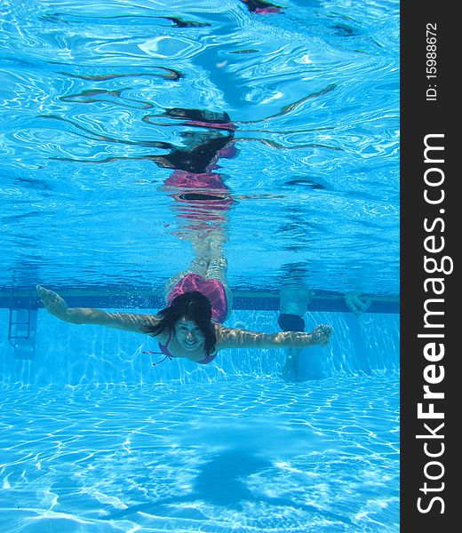 Swimming underwater photo of a women