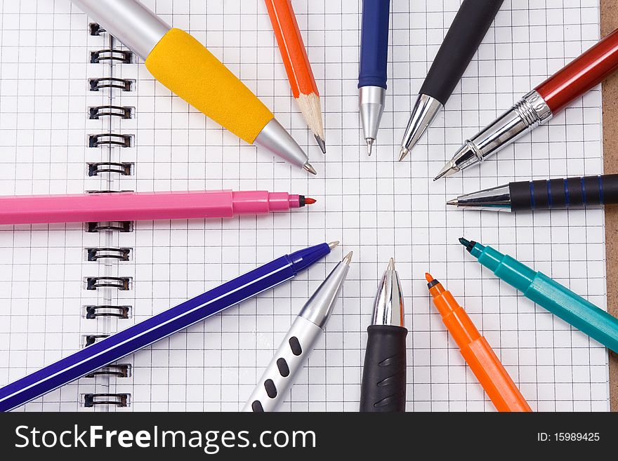 Horizontal image of pad and pens