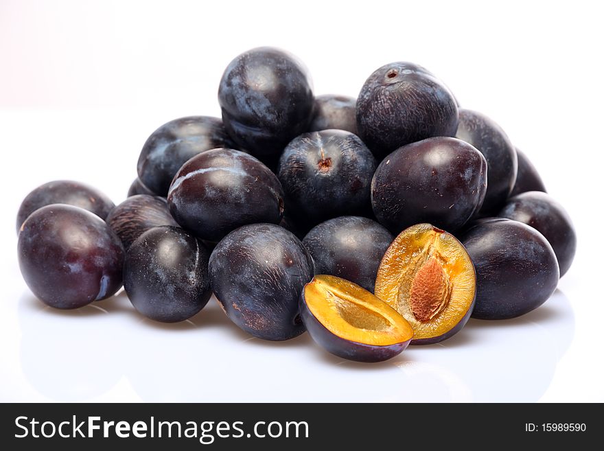 Fresh plums on a white background. Fresh plums on a white background