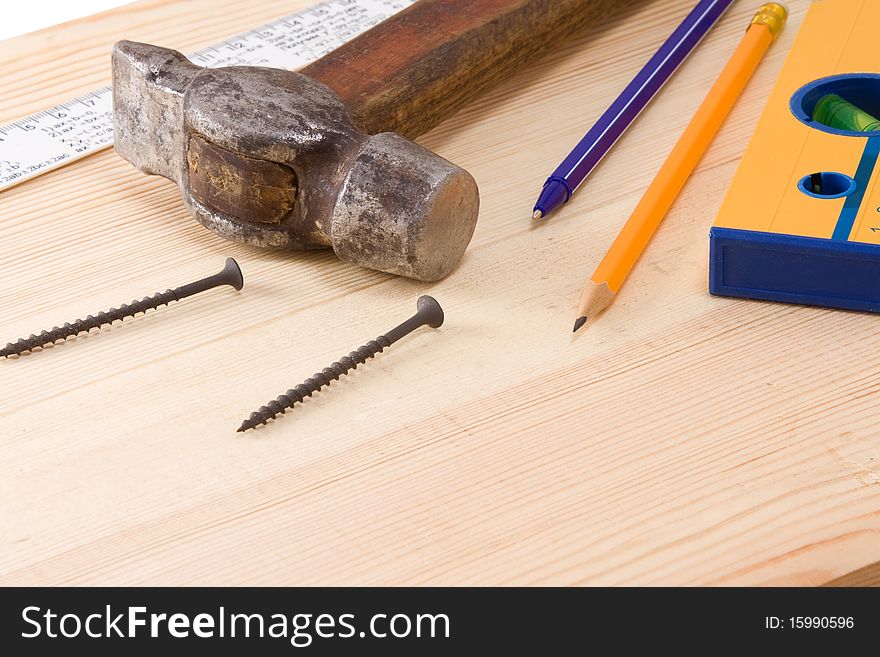 Set of tools on wood board