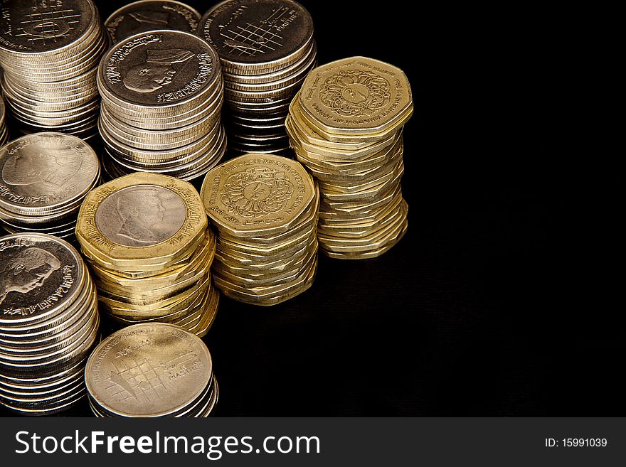Coins On Black Background