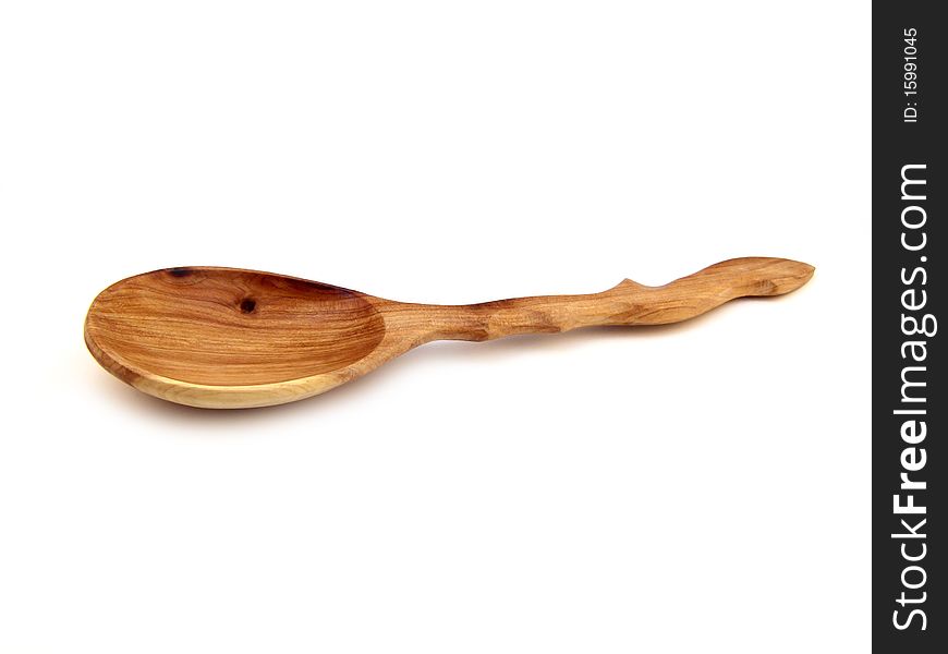 Wooden spoon isolated o a white background