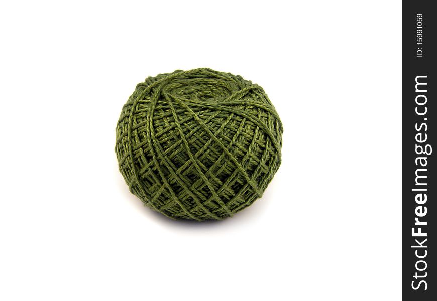 Wool curled into a ball with single thread unreeled