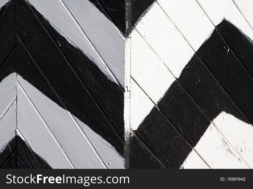 Painted in white and black stripes wall of the guardhouse. Texture, background
