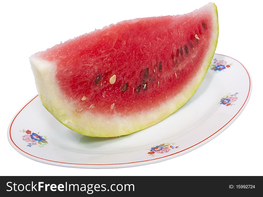 Watermelon on plate isolated on white with clipping path