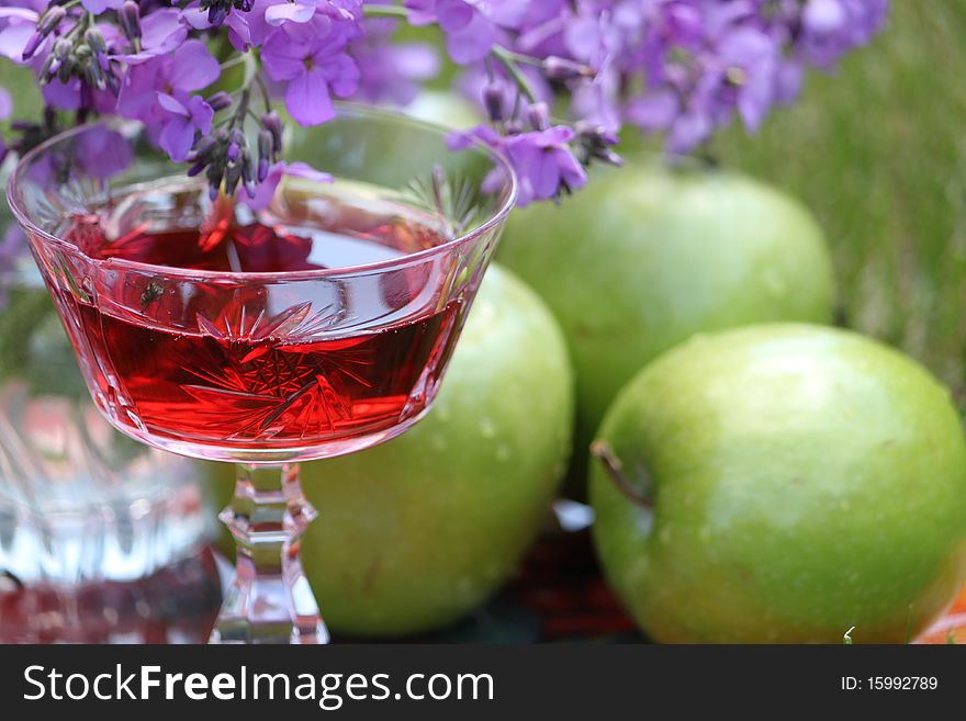 Red wine glass and fruits