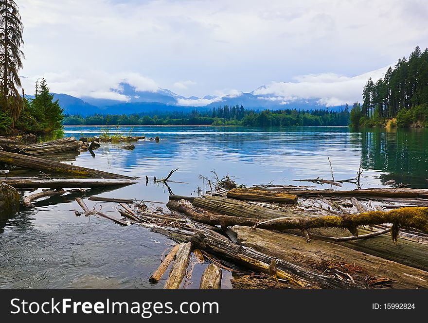 Landscape with  lake, trees and mountains. Landscape with  lake, trees and mountains