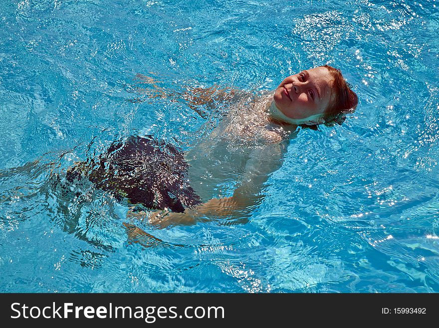 Child has fun in the pool