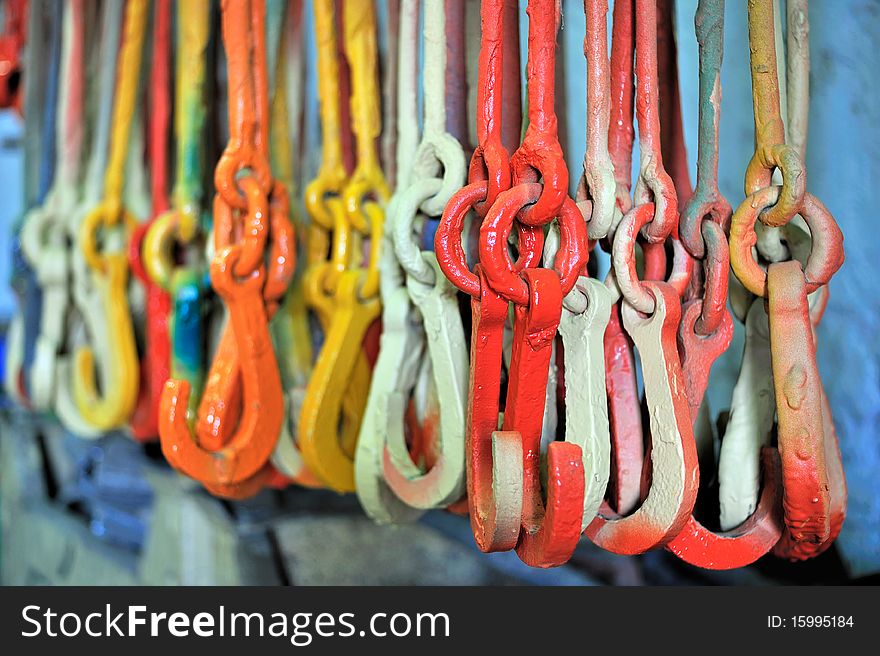 Colorful painted clamps used in painting yard