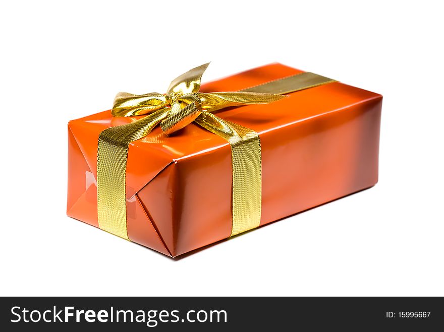 Gift box with golden ribbon,isolated on the white