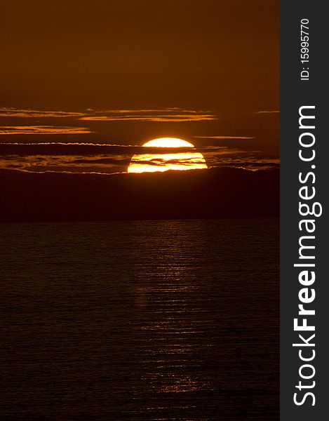 Sunset with Clouds over the open sea near Sumburgh Shetland. Sunset with Clouds over the open sea near Sumburgh Shetland