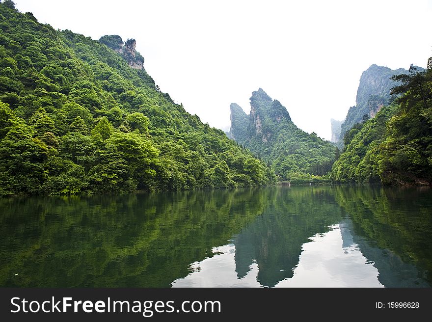 A World Natural Heritage in South China, Zhangjiajie is consisted of more than 3,000 quartz sandstone pillars, and many Karst caves. A World Natural Heritage in South China, Zhangjiajie is consisted of more than 3,000 quartz sandstone pillars, and many Karst caves.