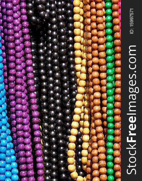 Hanging necklaces on a market stall