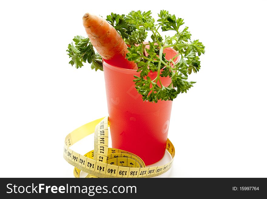 Parsley with tape measure and carrot