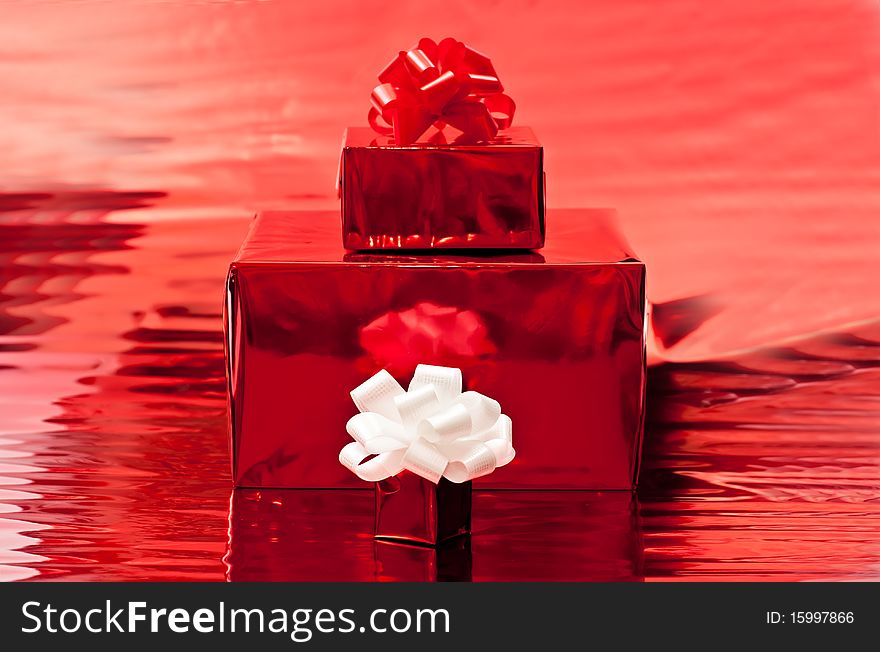 Red presents with bows. Red background
