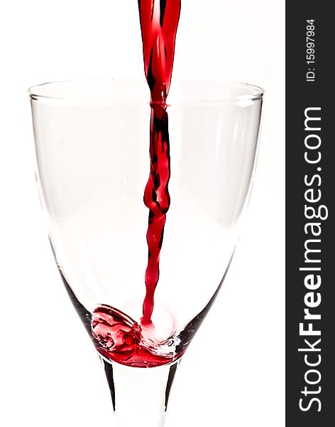 Red Wine Is Flowing Into The Wine Glass V1