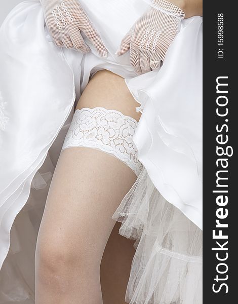 Bride shoving her stockings