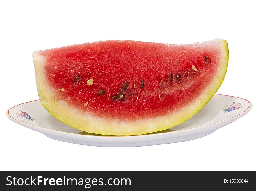 Watermelon on plate isolated on white background