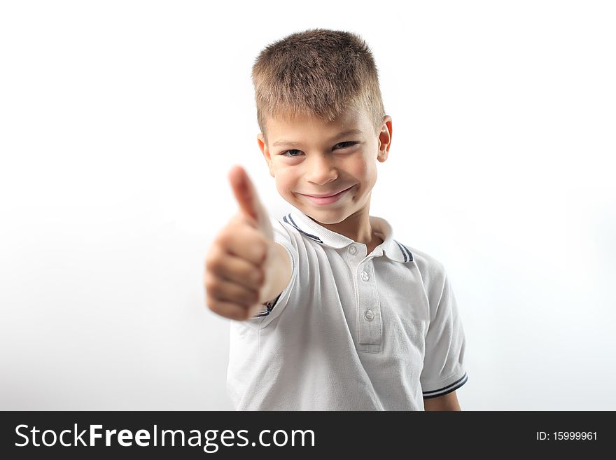 Smiling child with thumbs up. Smiling child with thumbs up