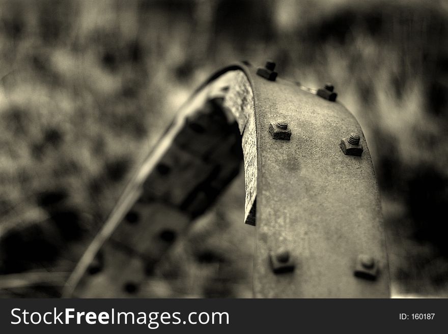 Abstract closeup of an old, twisted, iron railing. Abstract closeup of an old, twisted, iron railing