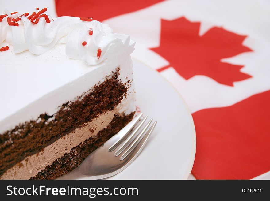 Delicious chocolate cake and Canadian Flag. Delicious chocolate cake and Canadian Flag