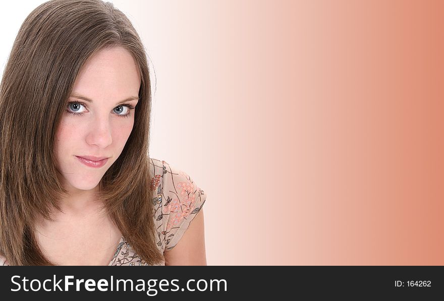 Close Up Of Beautiful Twenty Year Old Woman. This model has great skin and very light make-up. Shot in studio with the Canon 20D. Close Up Of Beautiful Twenty Year Old Woman. This model has great skin and very light make-up. Shot in studio with the Canon 20D.