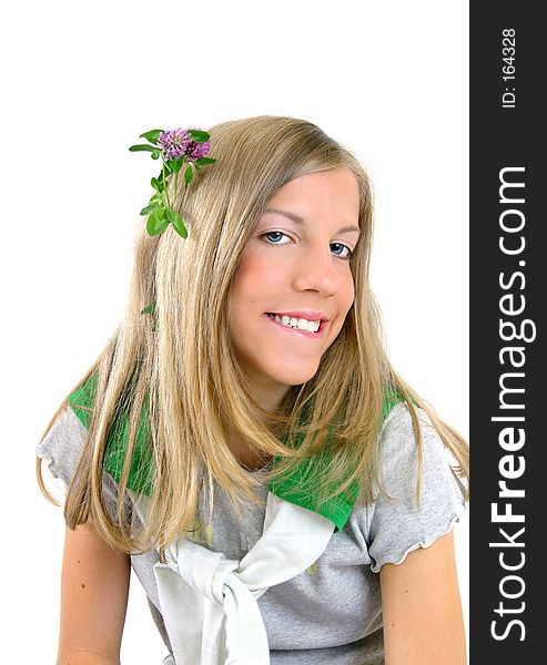 Portrait of a girl with flowers in her hair. Portrait of a girl with flowers in her hair.