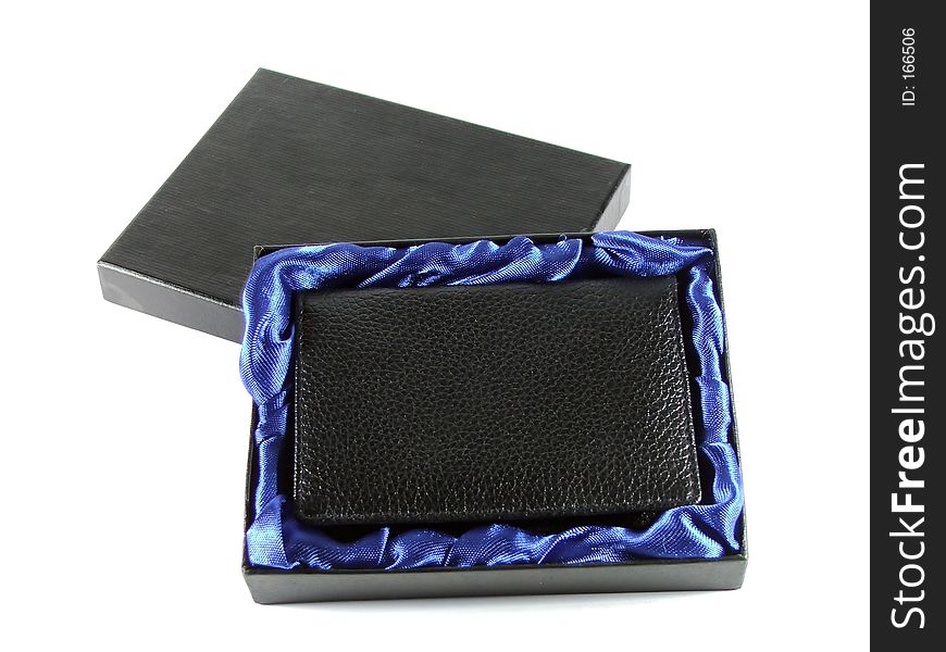 Gift box with a small leather wallet in it. Gift box with a small leather wallet in it